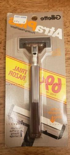 Sealed GILLETTE Atra Plus pivoting head razor, one twin blad